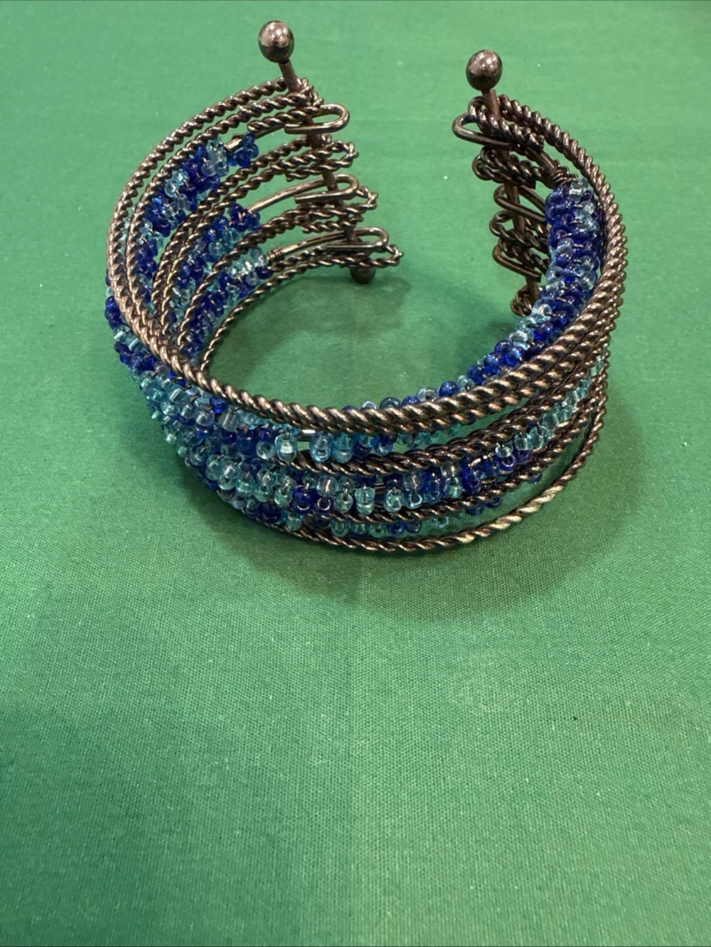 Multi strand Blue Beaded And Twisted Metal Cuff Bracelet. 89D